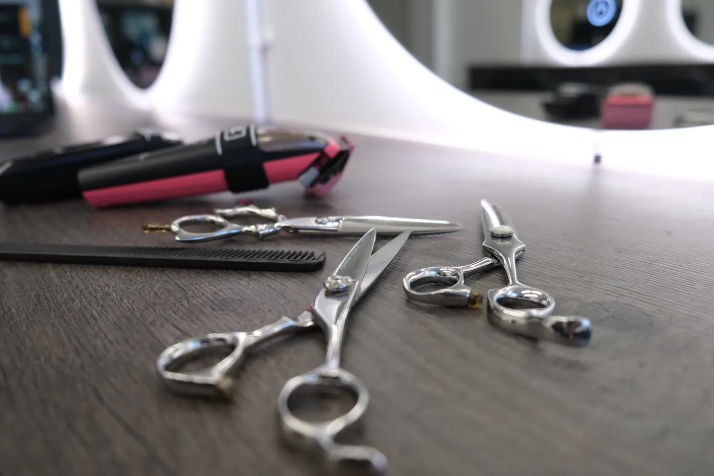 Professional styling scissors at a Harbour Hair station